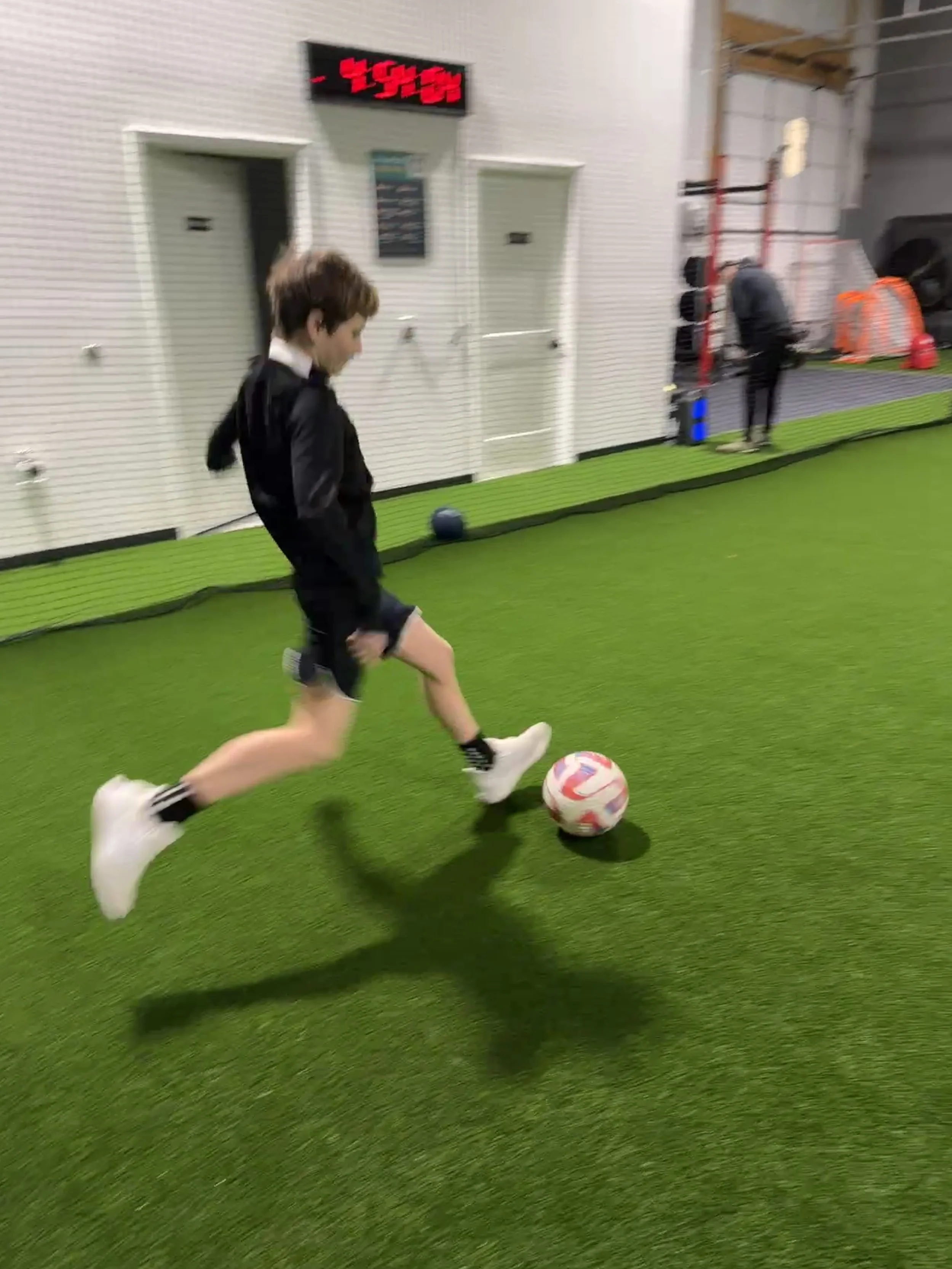 Indoor sports facility with turf for speed, agility and strength and conditioning sessions.