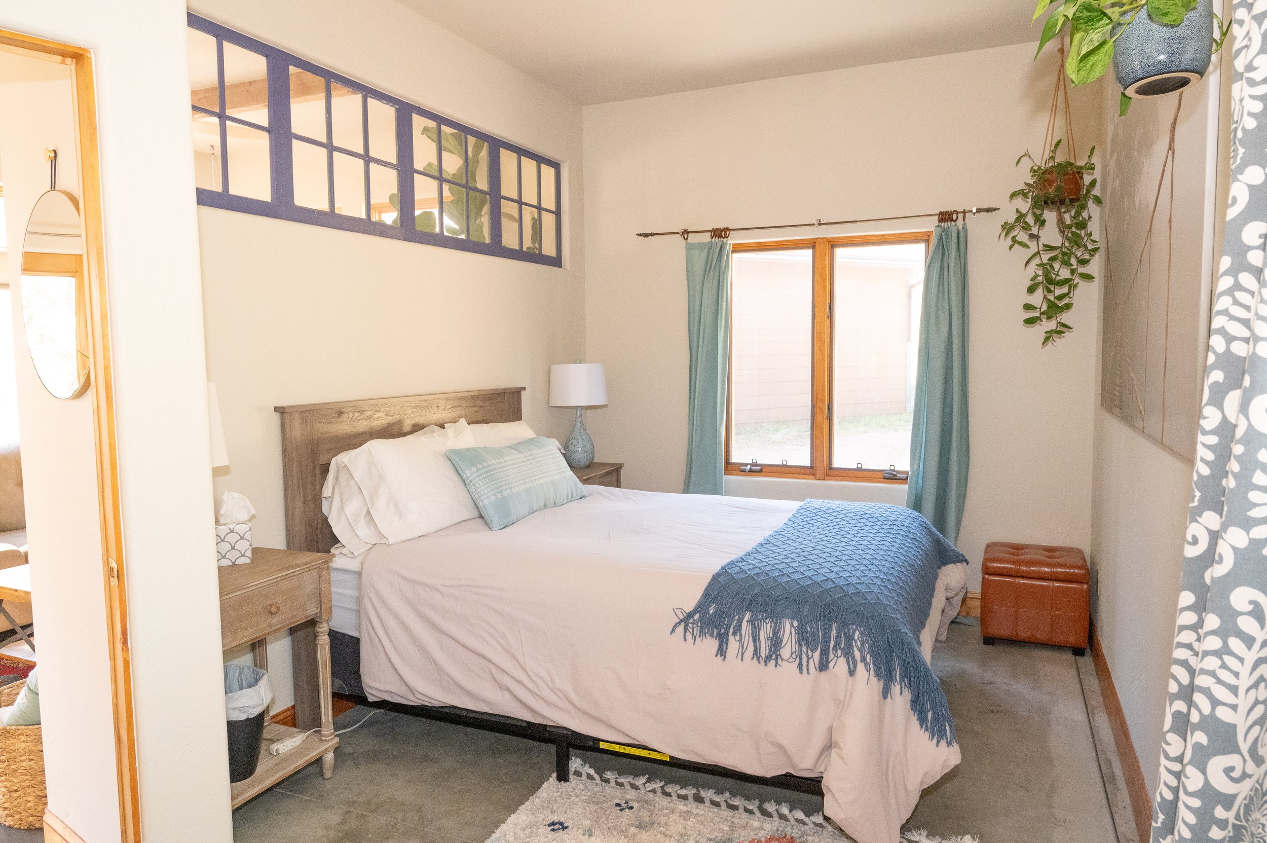 Bedroom with Queen bed at Zen Mountain cabin rental in Nederland, Colorado