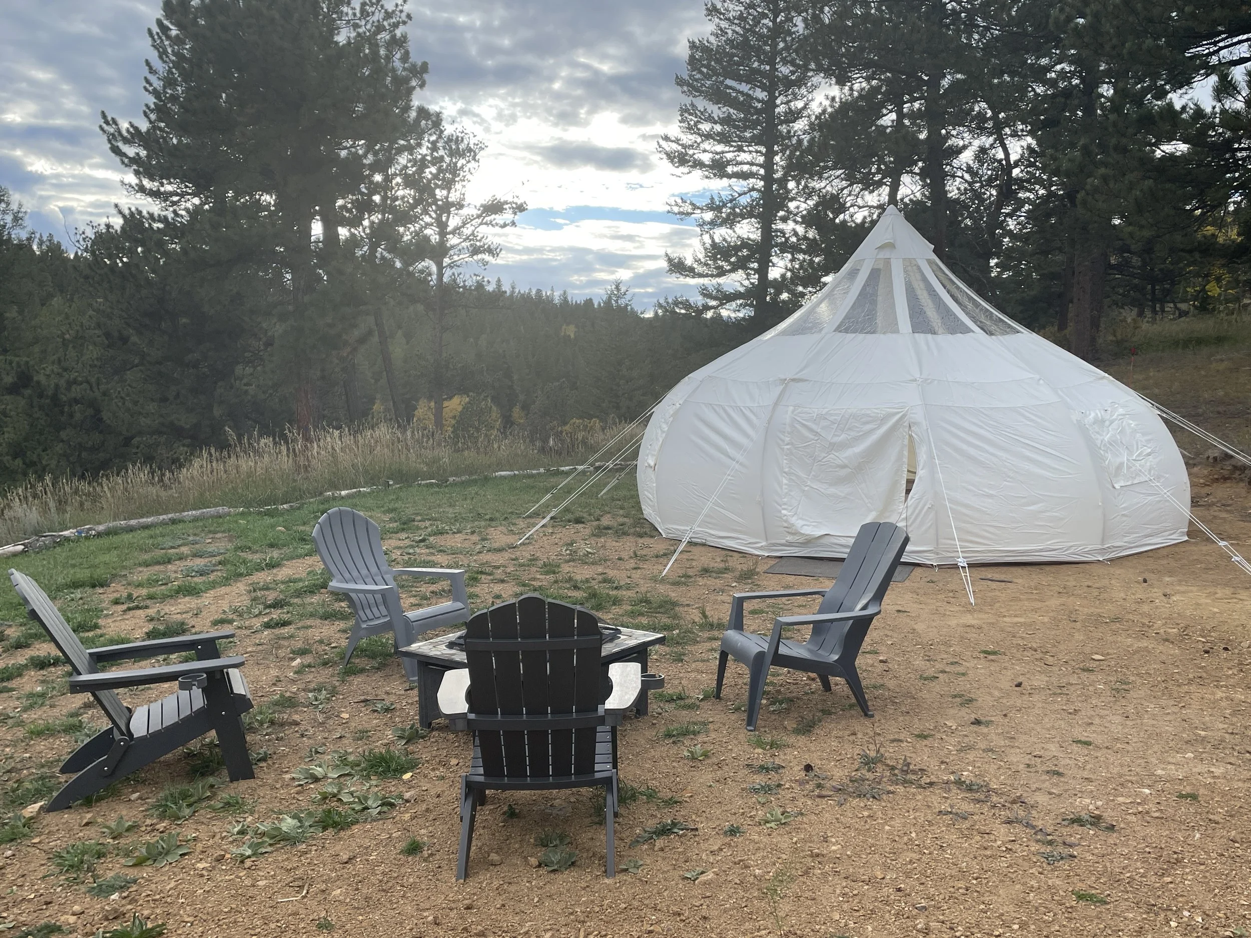 Zen moutain field, gathering tent and fire pit 