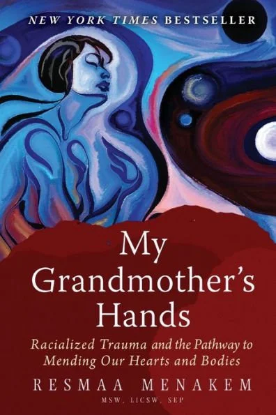 Book cover titled "My Grandmother's Hands" by Resmaa Menakem, featuring an abstract artwork of a woman with dark hair, closed eyes, and a blue-toned face, surrounded by swirling patterns in blue, red, and black.