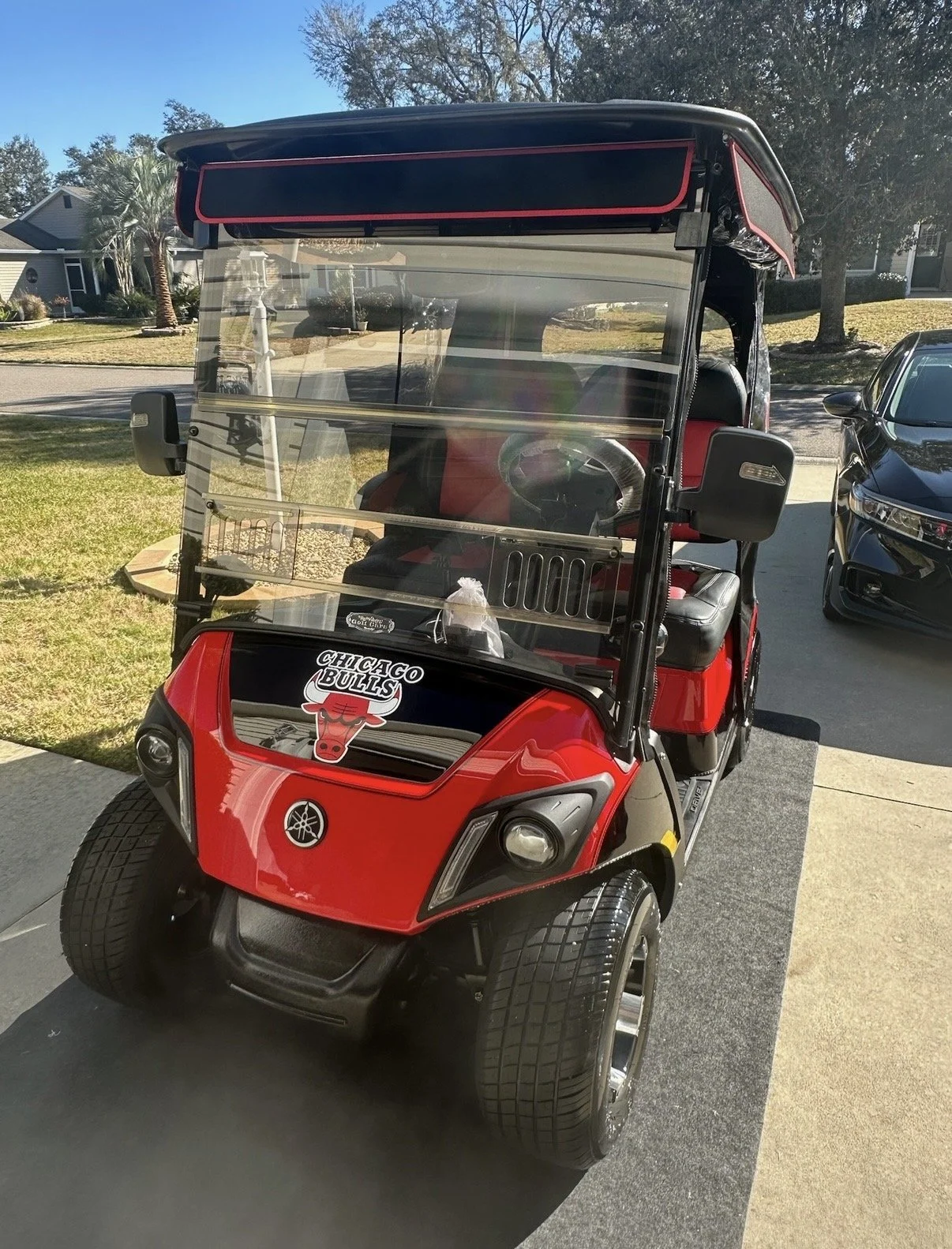 red clean golf cart