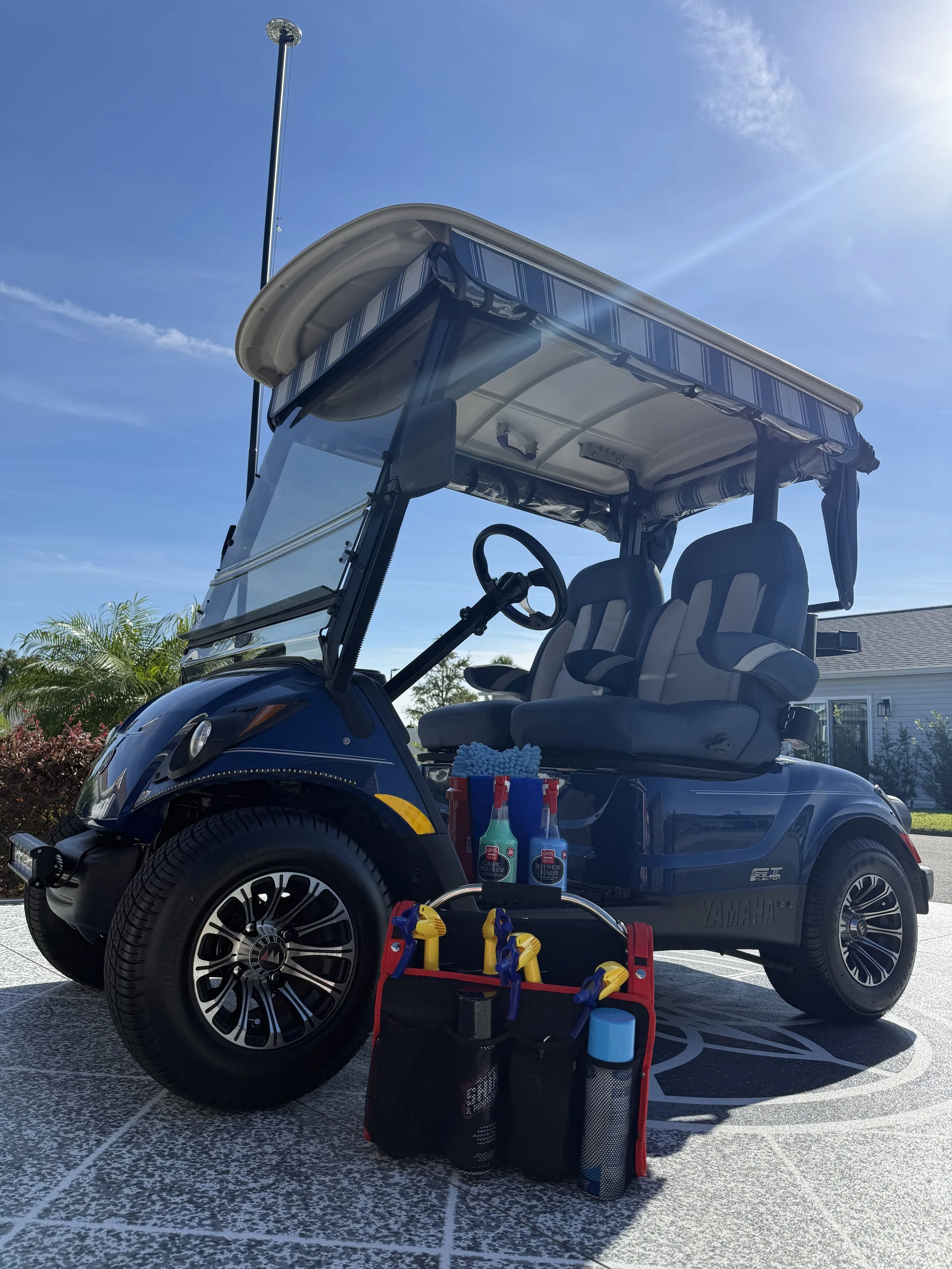 golf cart and cleaning supplies