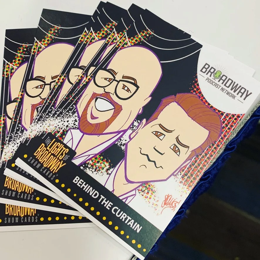 Illustrated show card for 'The Lights of Broadway' featuring cartoon versions of two performers, one with glasses and a beard, smiling, and the other with fangs, showing a distressed expression, on a multicolor glittery background.