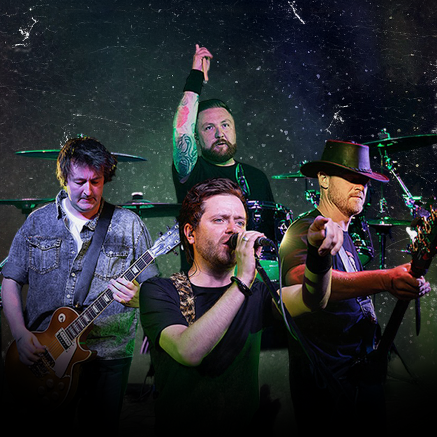 A band of four male musicians performing on stage with a dark, textured background. One is playing the guitar, one is singing into a microphone, and two are behind drums. The musicians are expressive and focused, with colorful stage lighting.