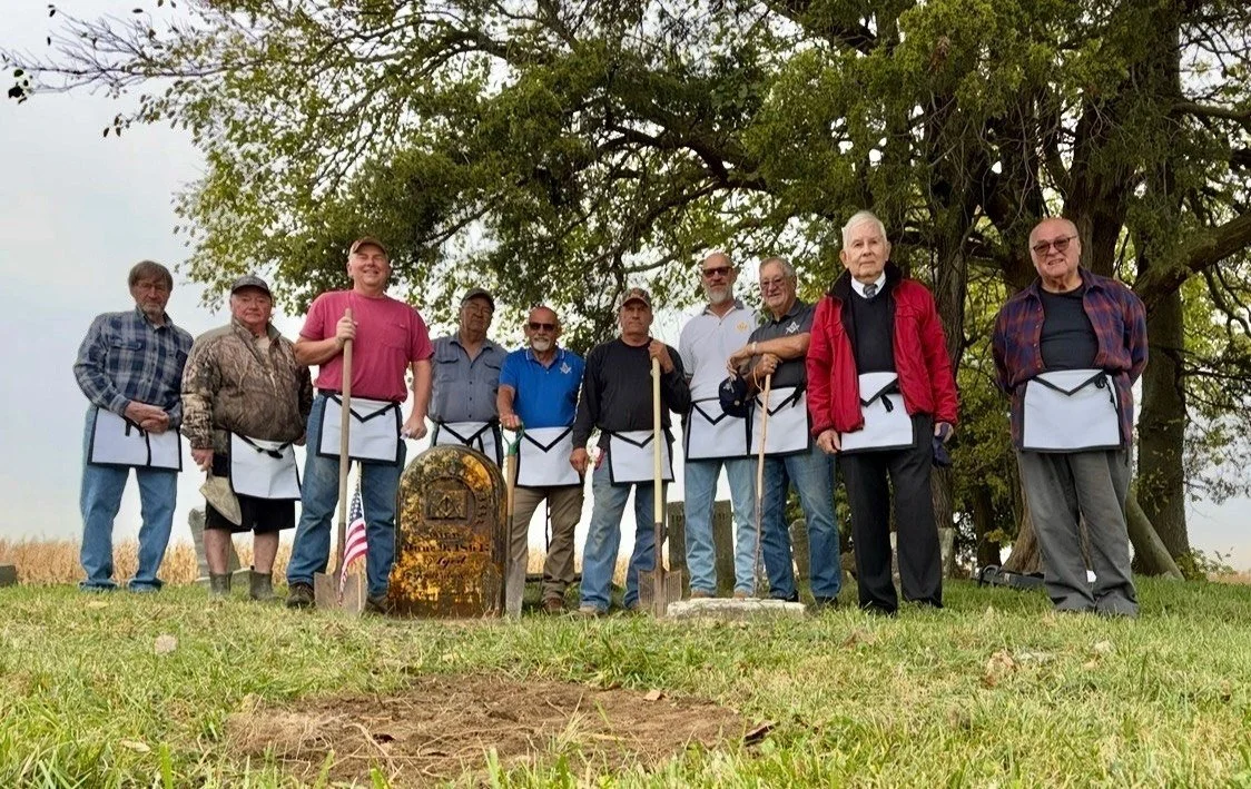 Masons from the Sabina and Leesburg lodges with the reset stone.