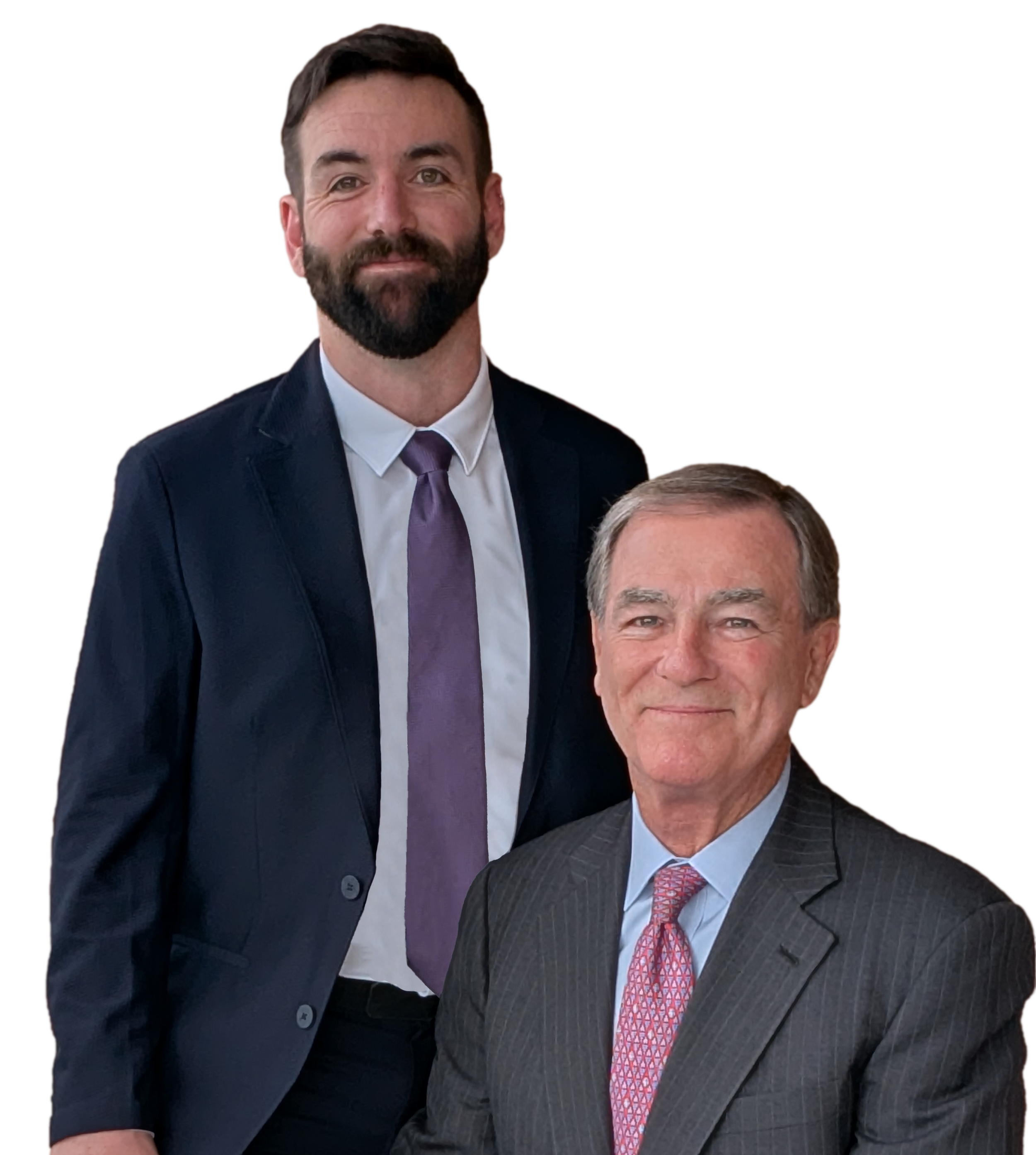 Two men, Joe and Kyle Matthews, smiling in formal suits, one with a beard and dark hair, and the other with gray hair.