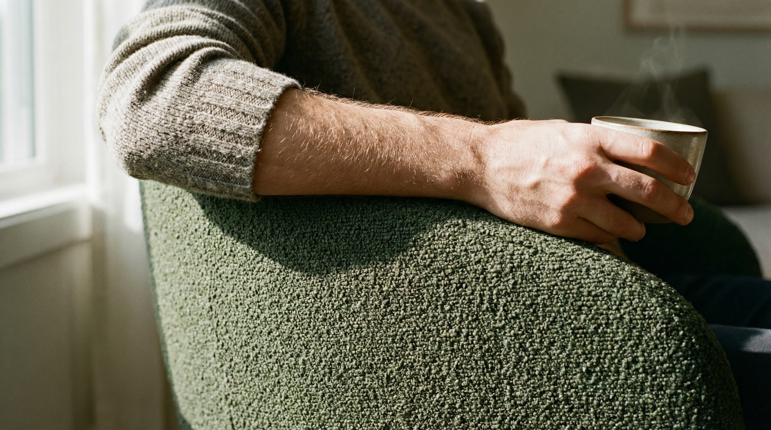 freepik__ultrarealistic-closeup-of-a-green-boucl-lounge-cha__33902.png