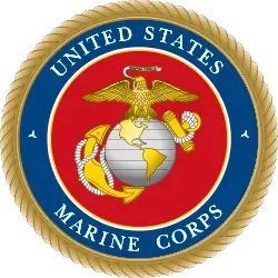 United States Marine Corps emblem with eagle, globe, and anchor on a red and blue background
