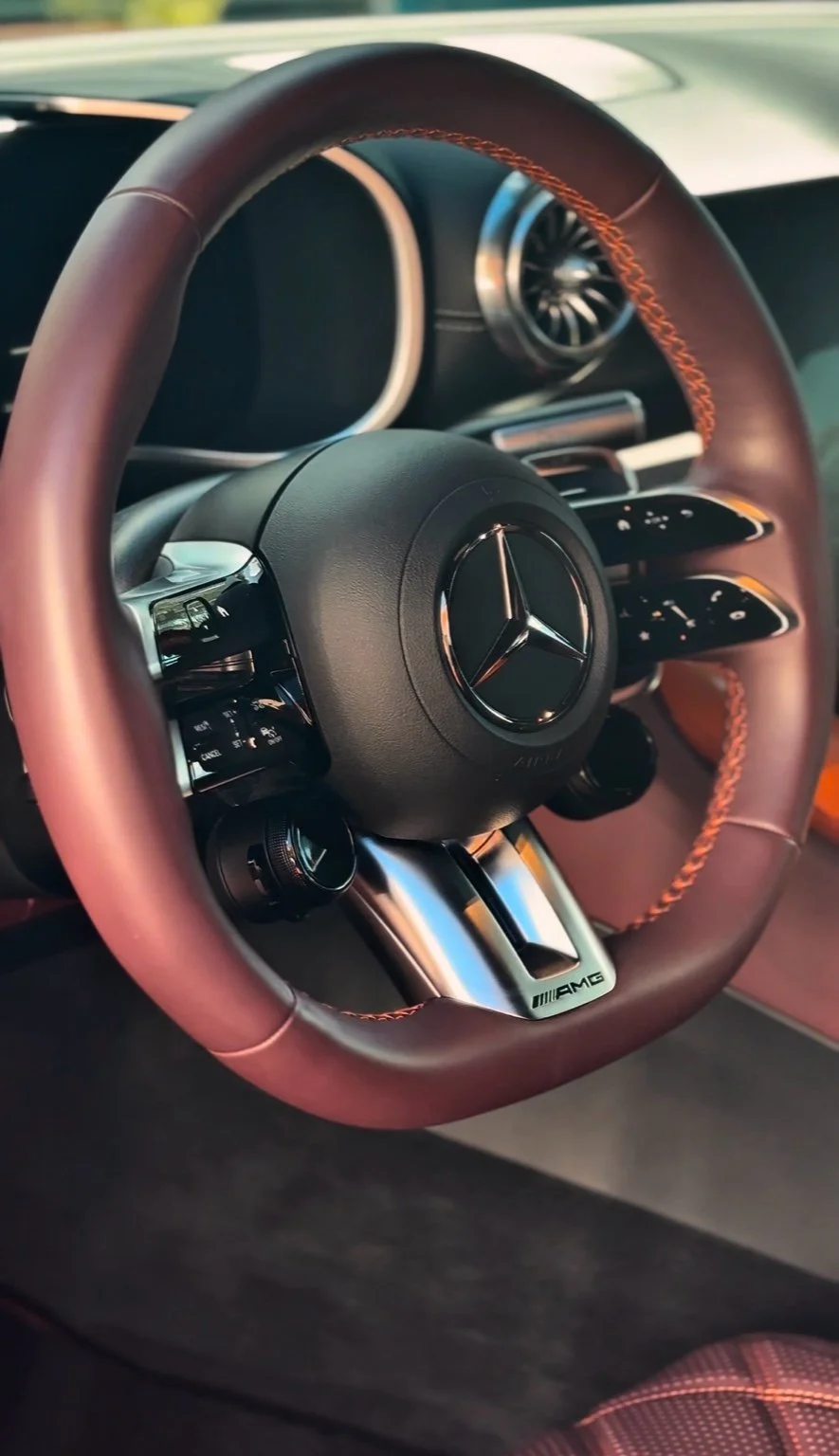 Mobile interior detailing service in North Naples FL restoring leather steering wheel and interior surfaces to like-new condition.