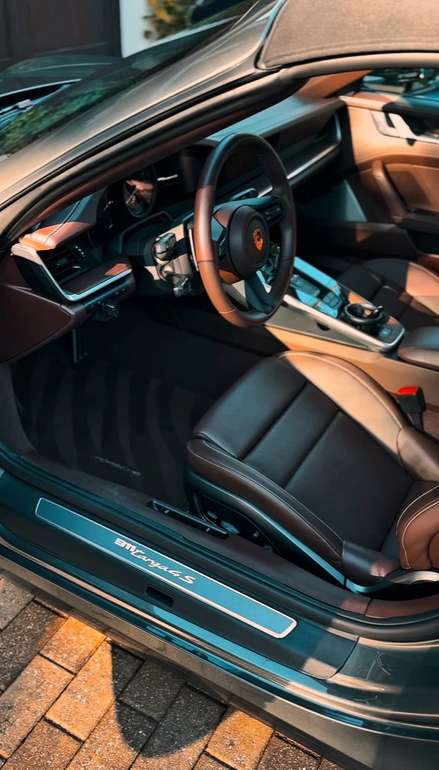 Luxury vehicle interior cleaned during a professional car detailing service in Naples Florida