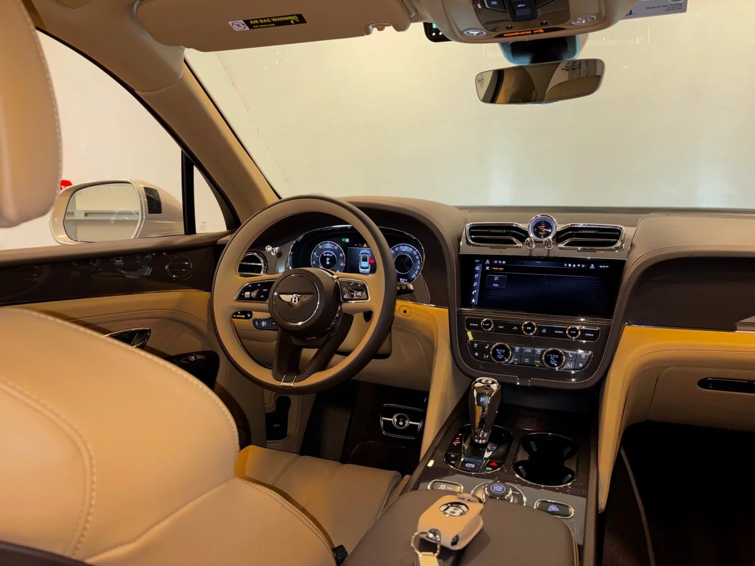 Detailed Bentley Bentayga dashboard and steering wheel after interior maintenance detailing