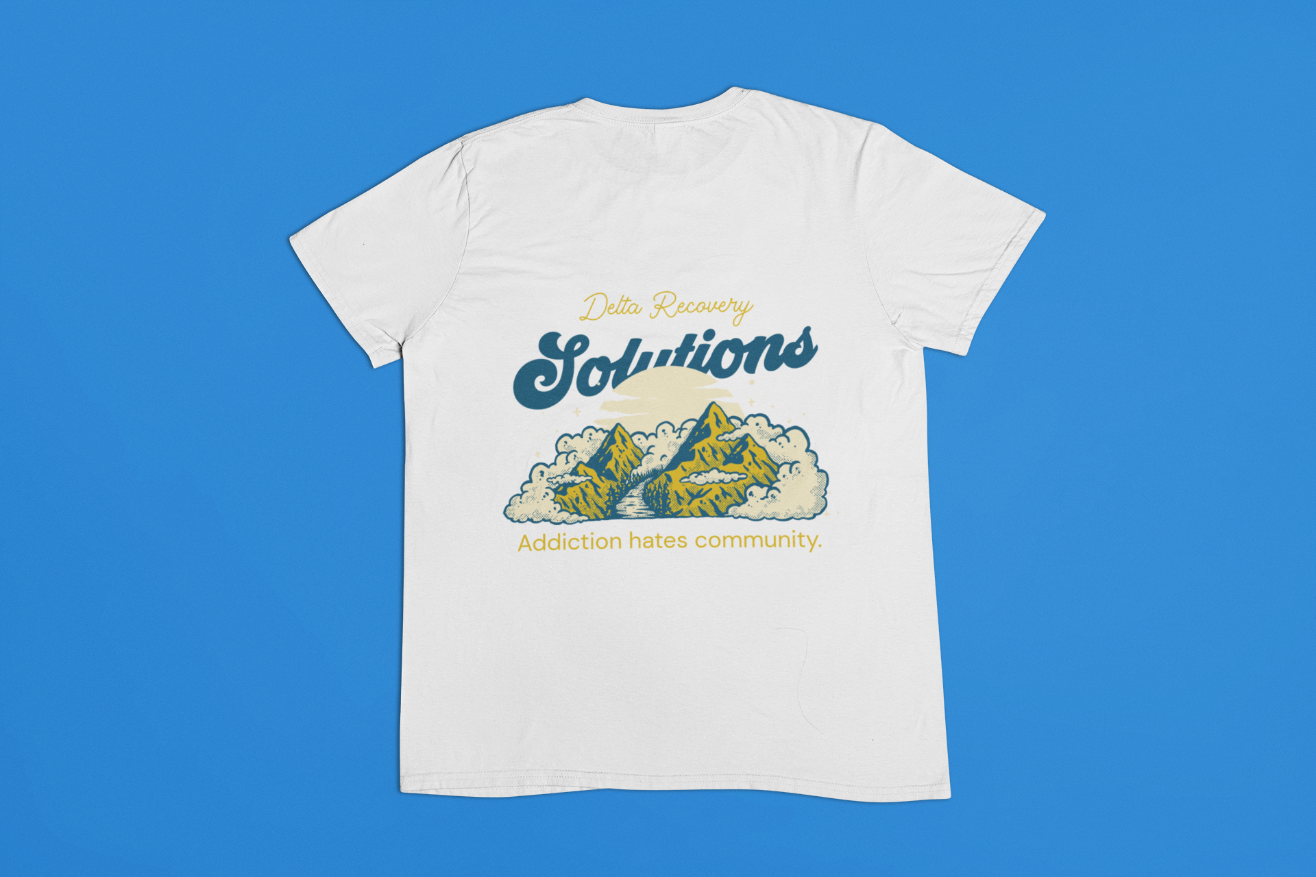 T-shirt with mountains and yeti logo.