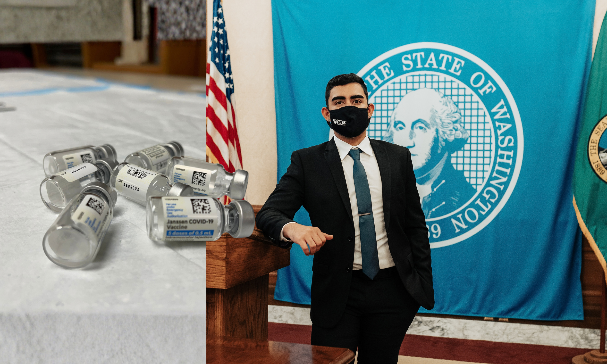 A young man in a suit and tie wearing a black face mask with the words "Healthy California" on it. He is standing next to a wooden podium with a large blue seal of the State of Washington behind him. To his left, there is a table with several vials of COVID-19 vaccine labeled "Janssen COVID-19 Vaccine".