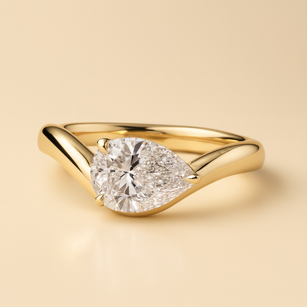 Pear soliatire east west fancy.png