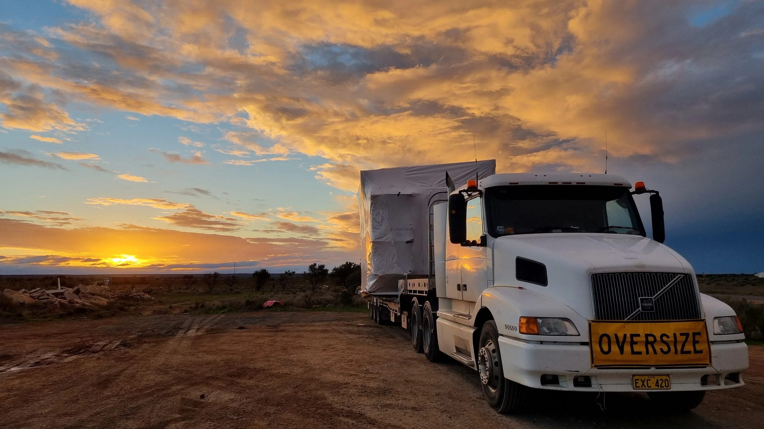 Volvo with Oversize switch room at sunset
