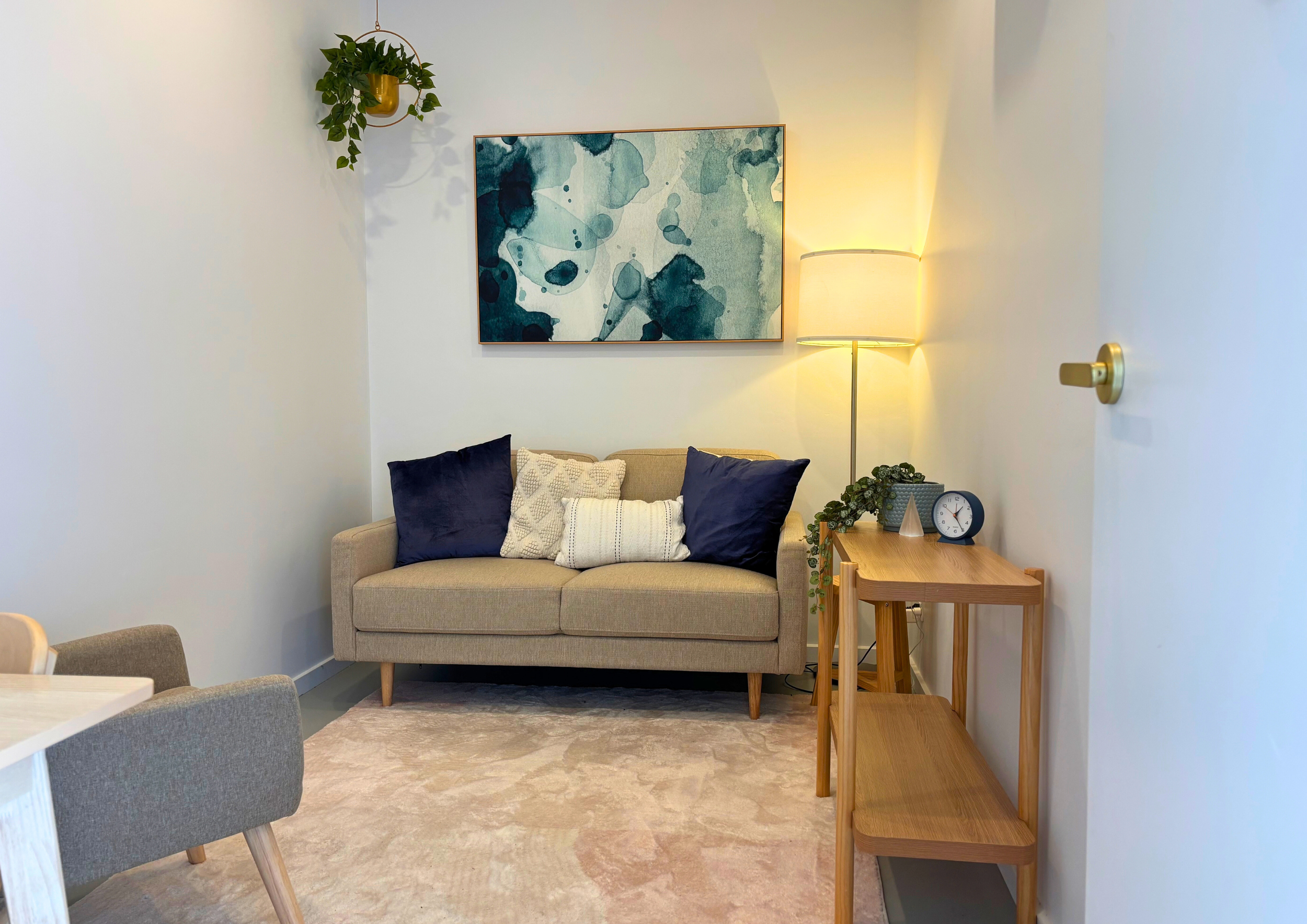 Holistic OM Queenscliff Psychology Room with Couch lamp wall art