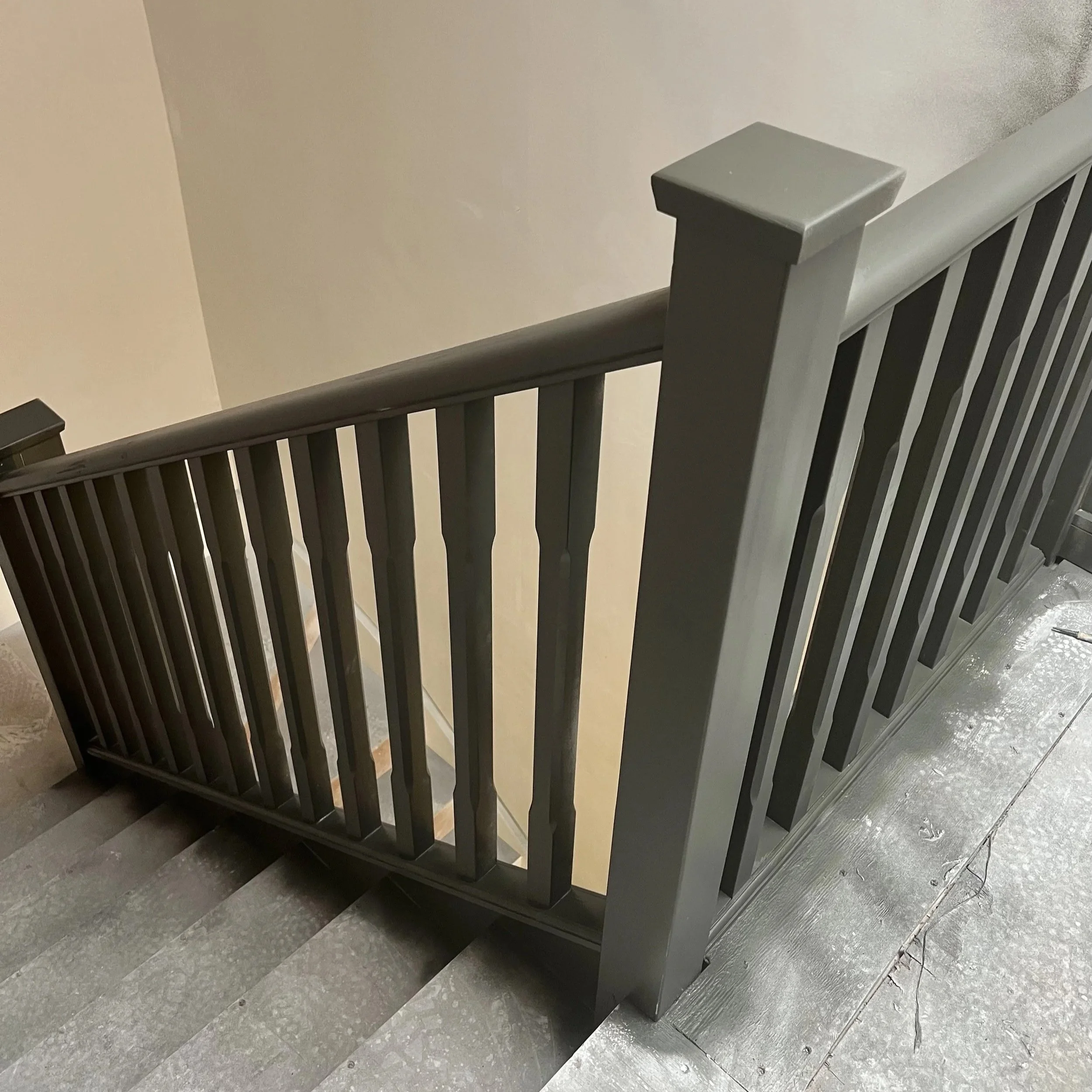 staircase bannisters spray painted by local sprayer CLX Coatings