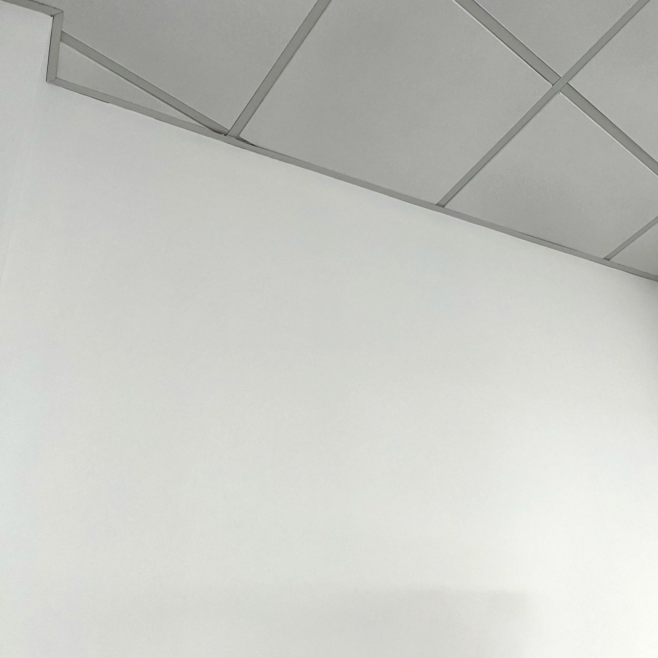 Commercial spraying to school walls painted by CLX Coatings