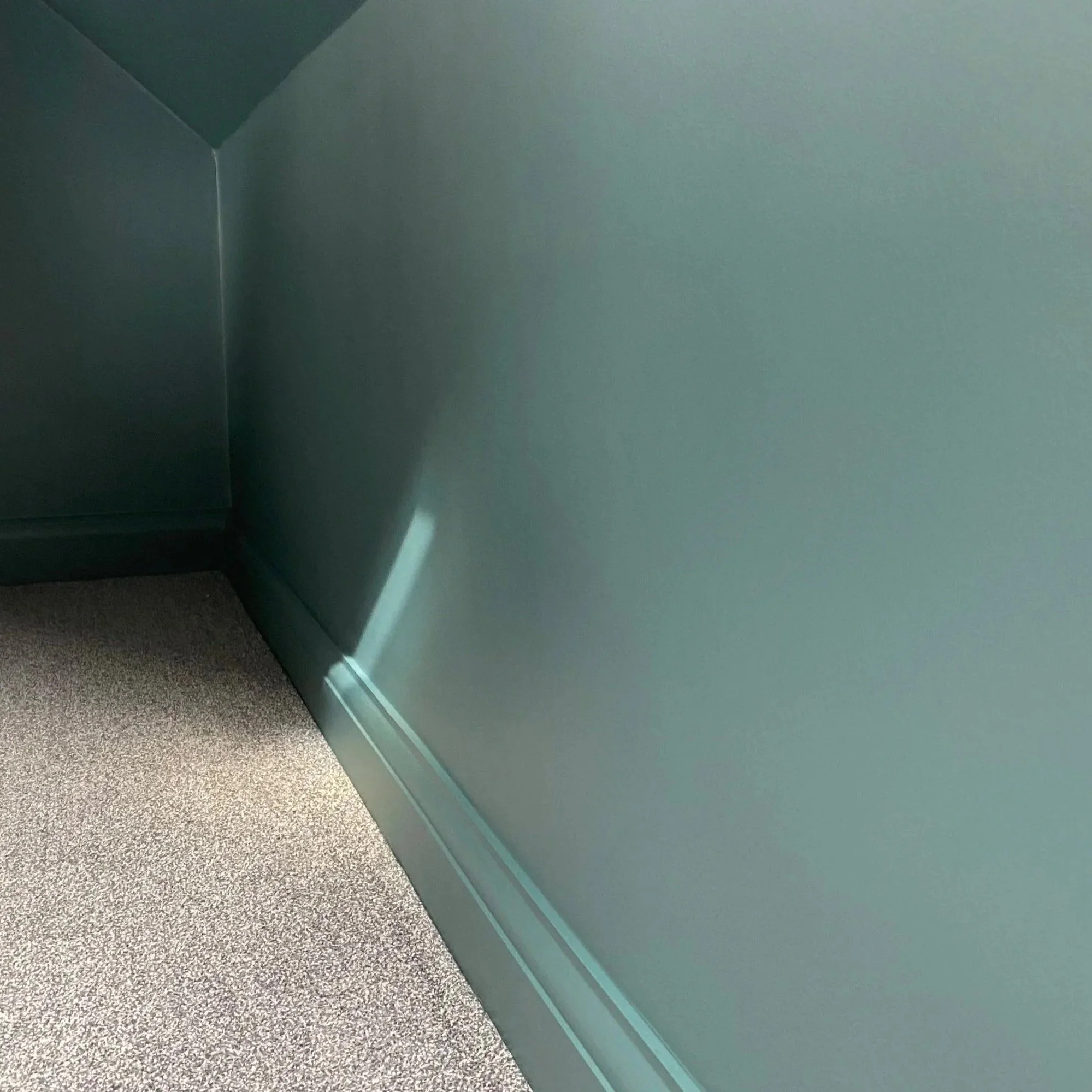 Completed wall and skirting by spray painter CLX Coatings
