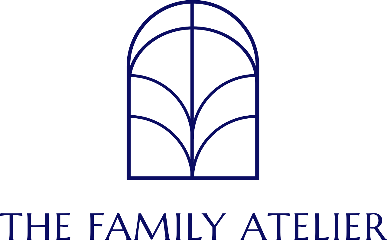 The Family Atelier logo with a stylized stained glass window motif.
