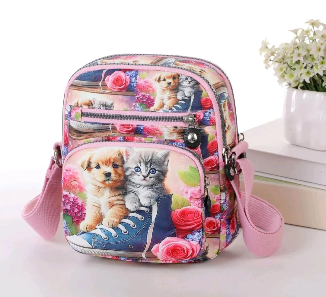 Kitten and Puppy Paradise Crossbody Bag