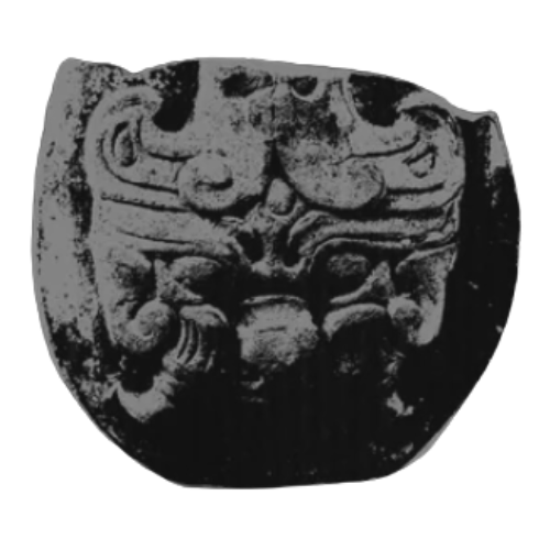 Ancient coin with intricate carvings of mythical creatures or animals.