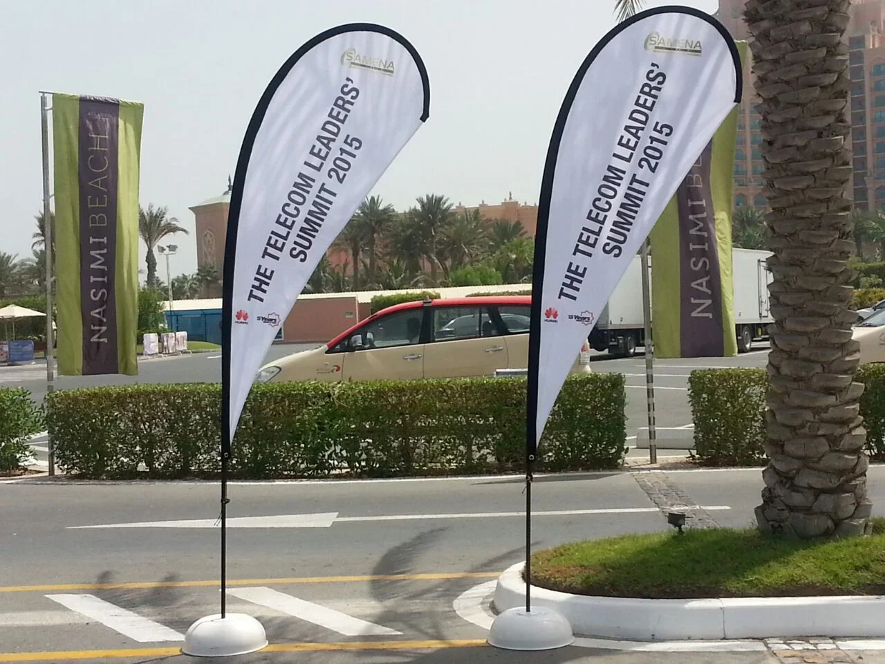 AMENA tear drop shaped flaga.webp