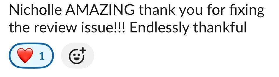 Screenshot of a message thanking Nicholle for fixing a review issue, with a heart icon showing 1 like and a smiling face icon.