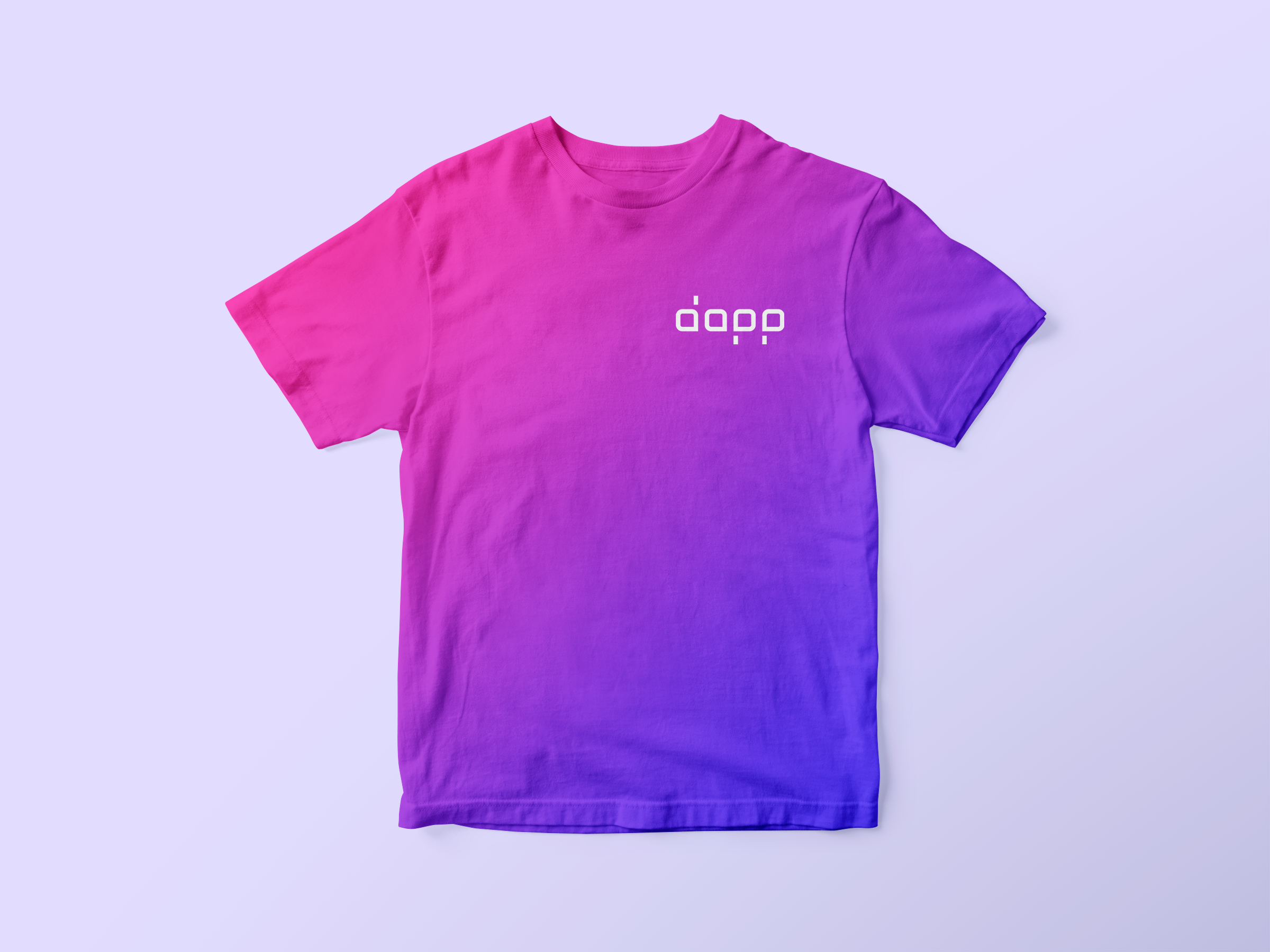 A t-shirt with a gradient color from pink to purple, featuring the word 'dopp' in white on the upper left chest area, laid out flat on a light purple background.