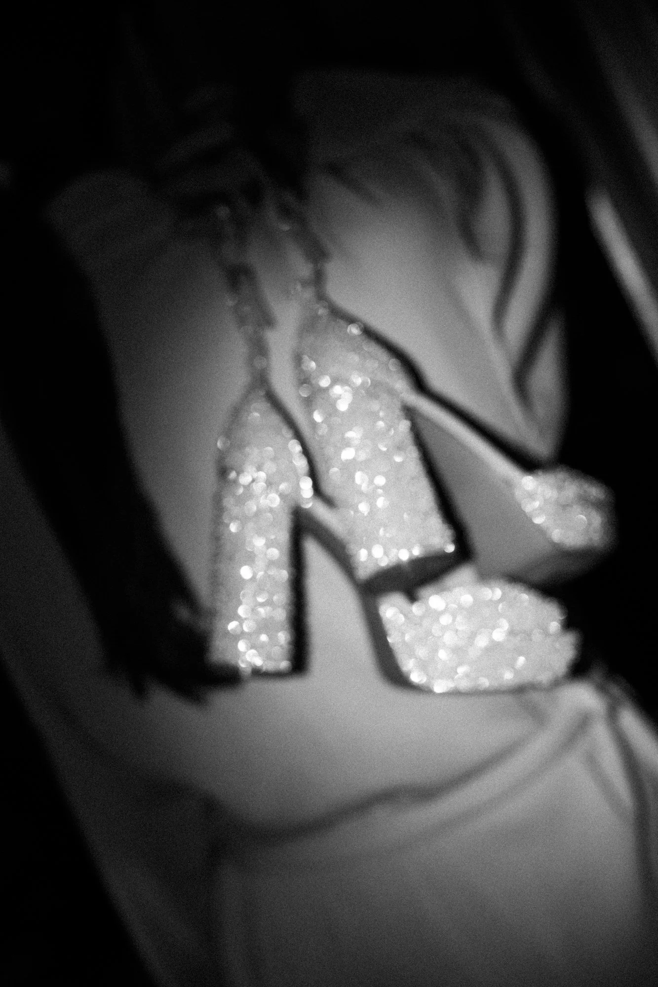 Close-up of shiny, glittery wedding shoes