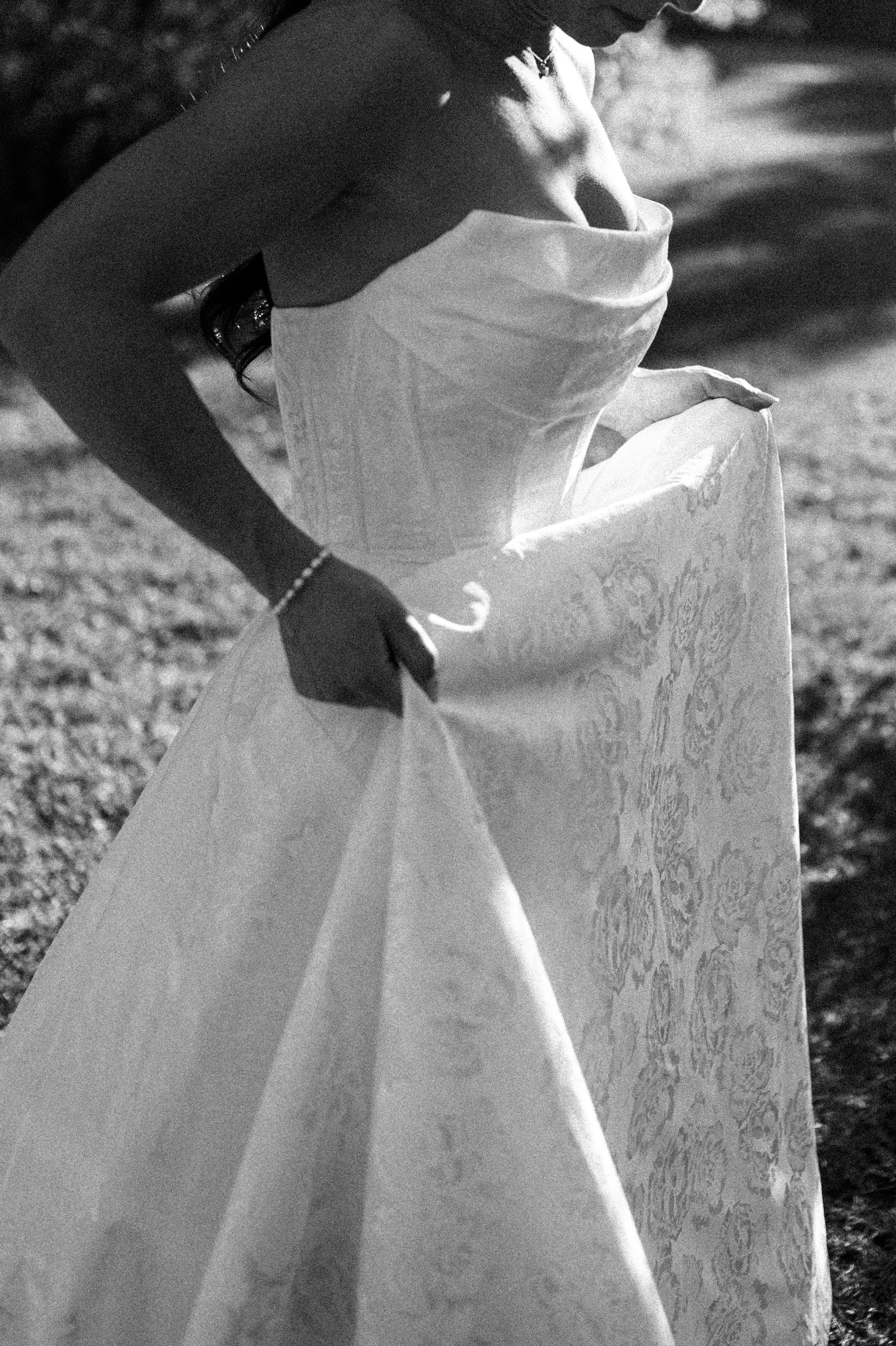 A bride running in her wedding dress