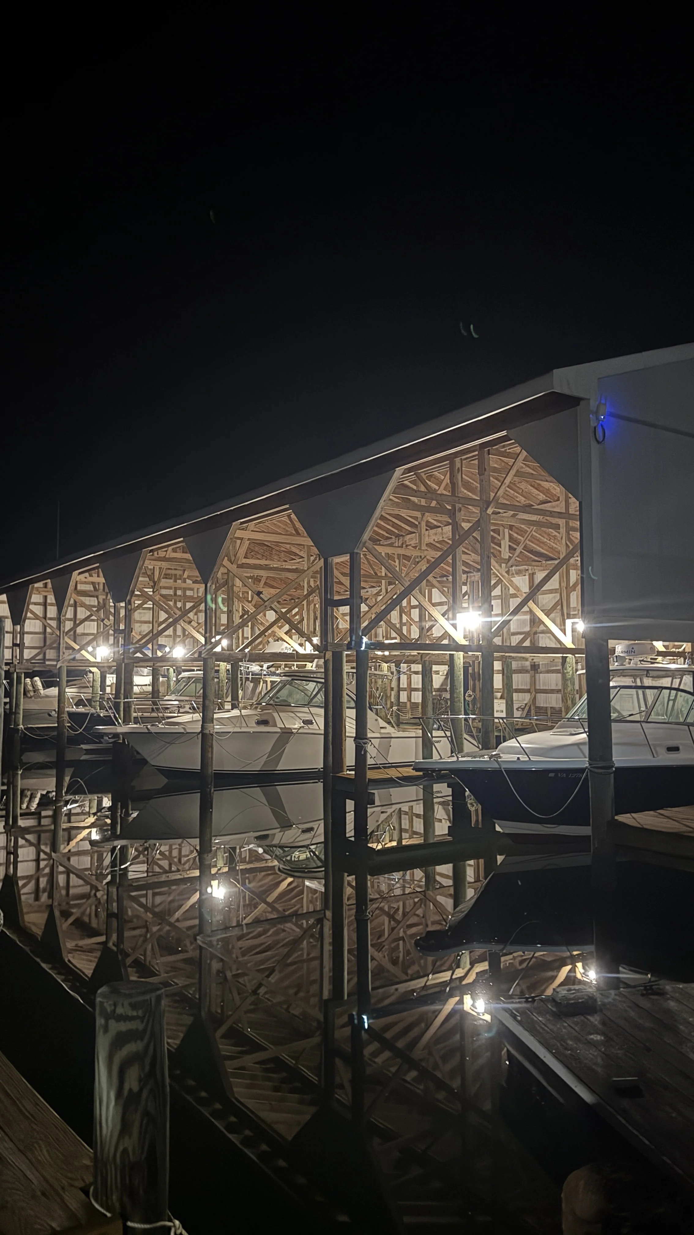 Code-Compliant Dock & Slip Power Systems
Expertly designed and installed marine electrical work built to withstand high moisture and harsh conditions. From secure slip branch circuits to overhead task lighting, we bring local boathouses up to current