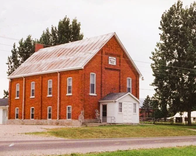 Old red brick church in the country.