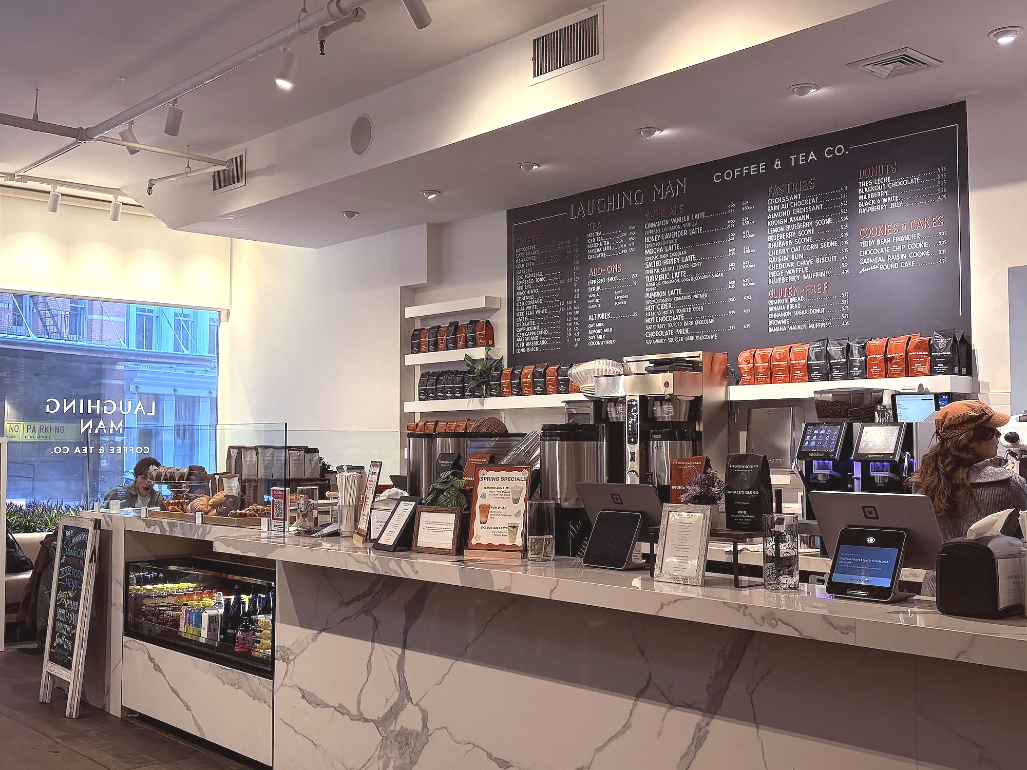 the laughing man coffee shop in tribeca, owned bu hugh jackman, works with non-profit foundations