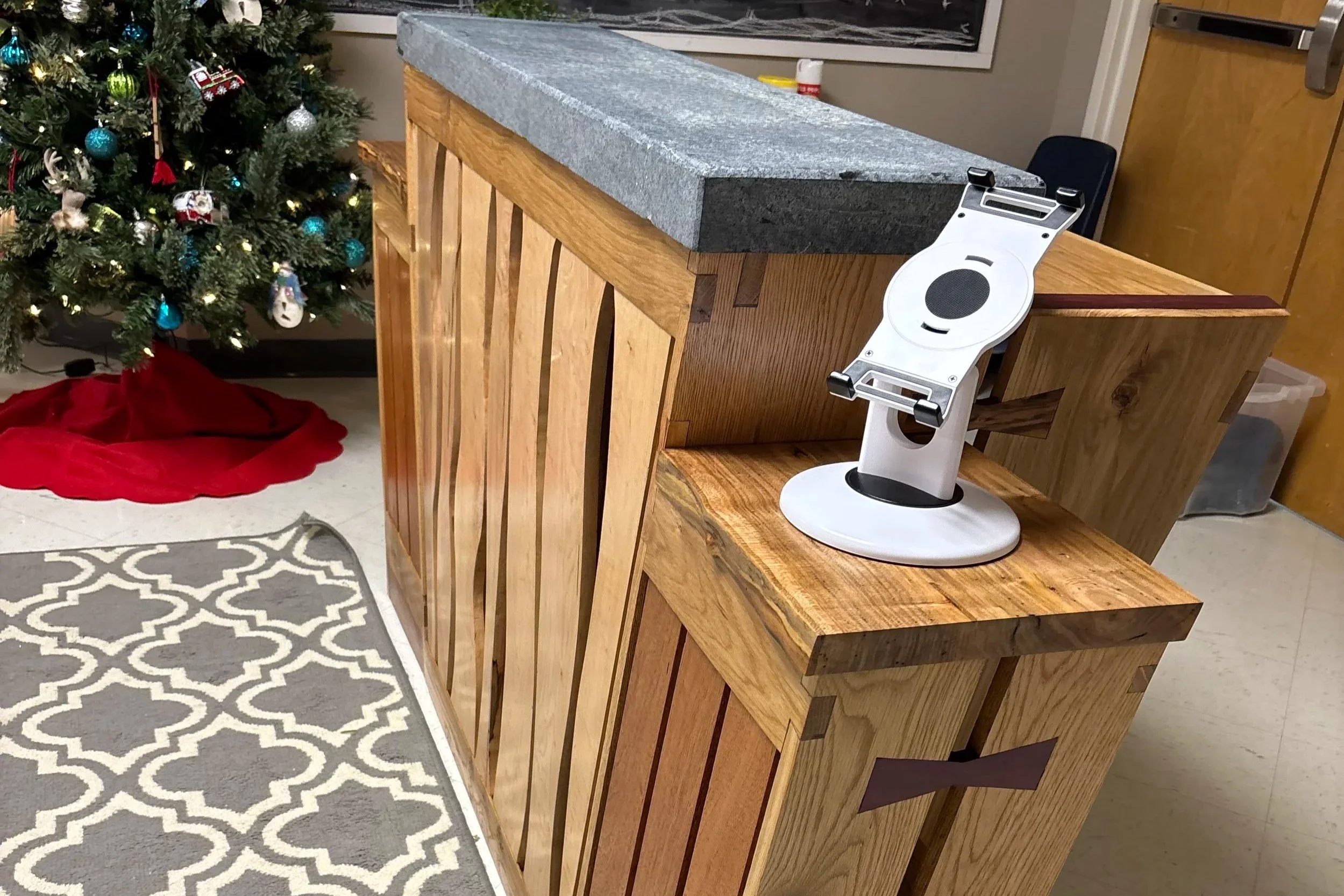 Oak, Maple, Mahogany, Purpleheart, and Patagonian Rosewood with Soapstone Reception Desk