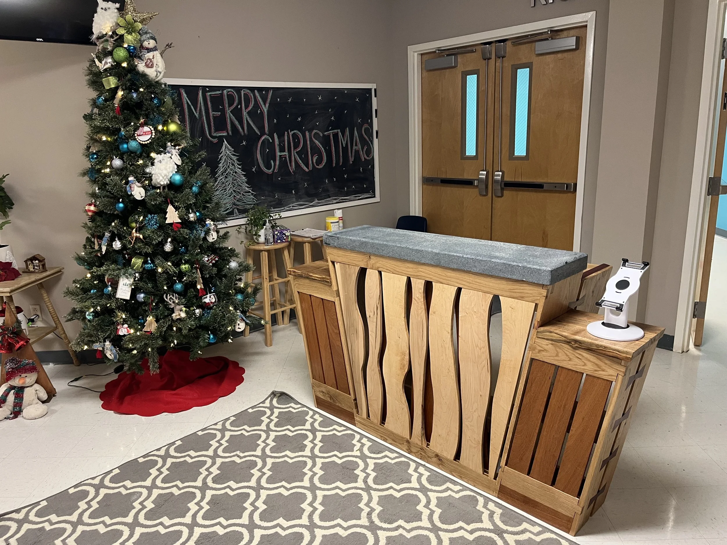 Oak, Maple, Mahogany, Purpleheart, and Patagonian Rosewood with Soapstone Reception Desk