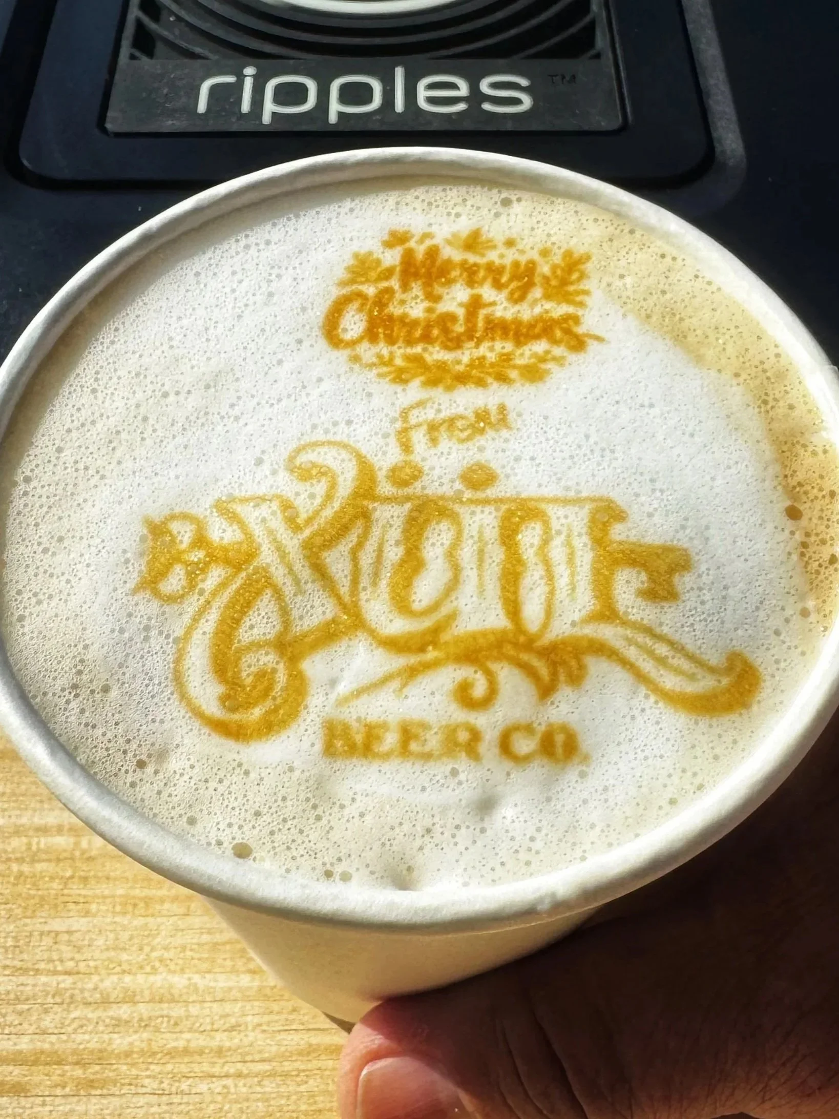 Custom latte art served from a mobile coffee cart at an event in Knoxville, Tennessee