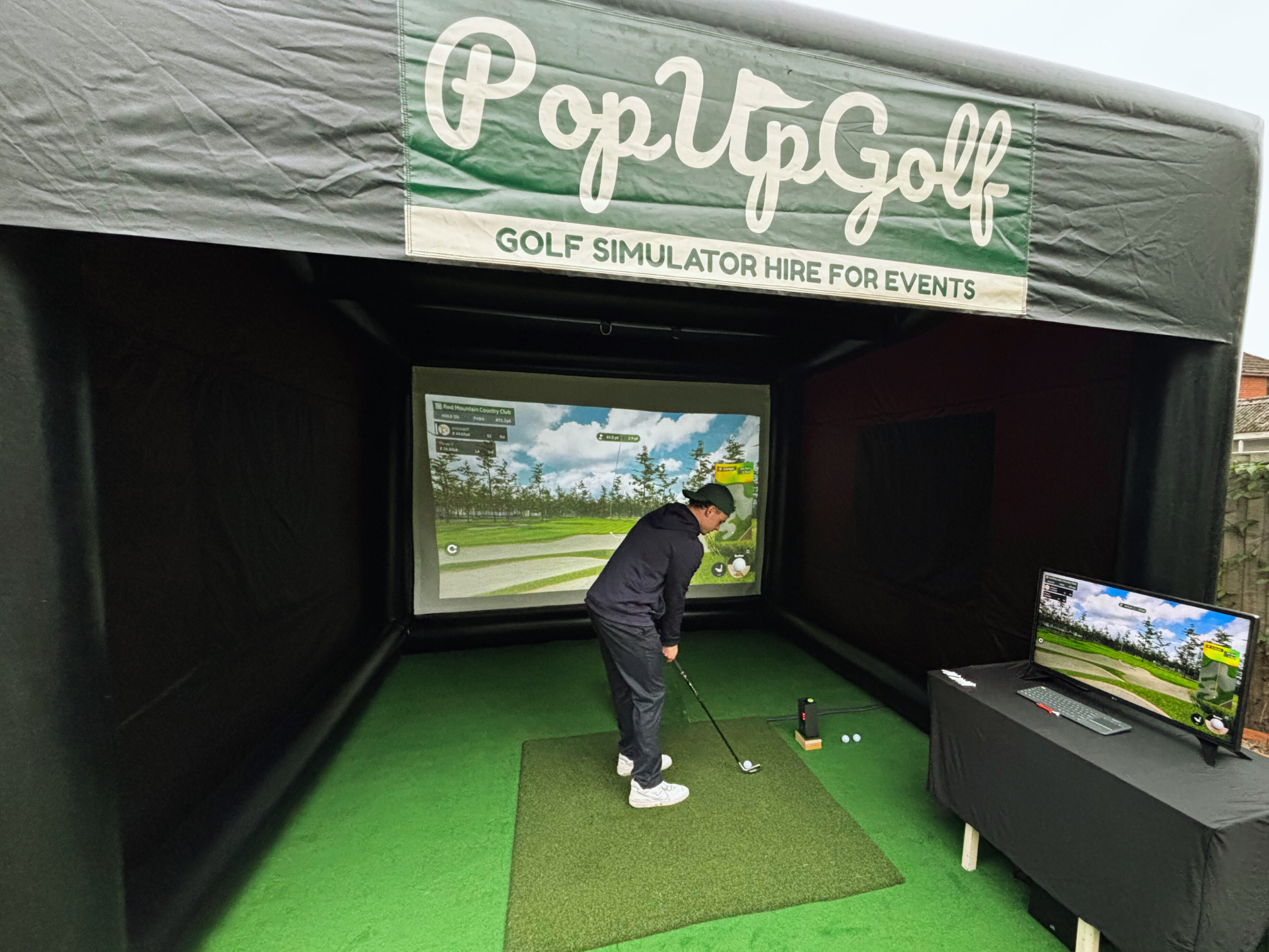 Golfer setting up to ball