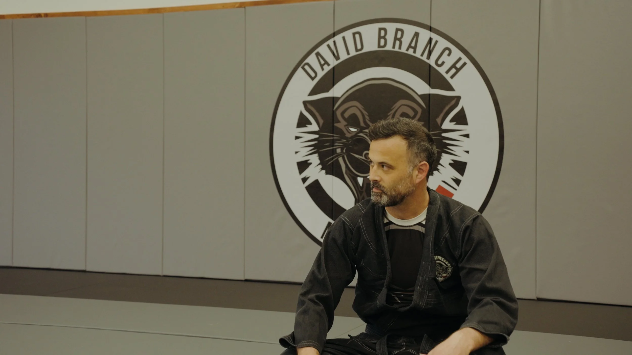 Matt Loy works closely with students to ensure proper technique and steady progression in both kids and adult Brazilian Jiu Jitsu classes.