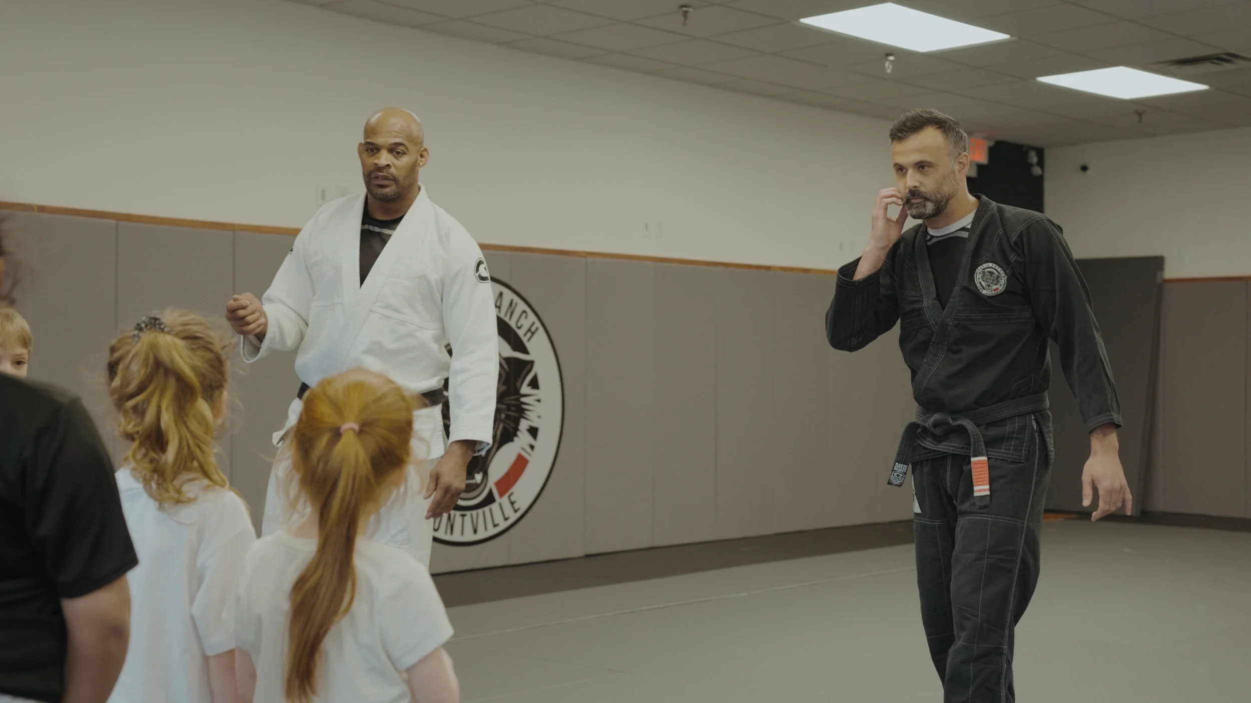 David Branch and Matt Loy teaching kids Brazilian Jiu Jitsu class in Montville NJ