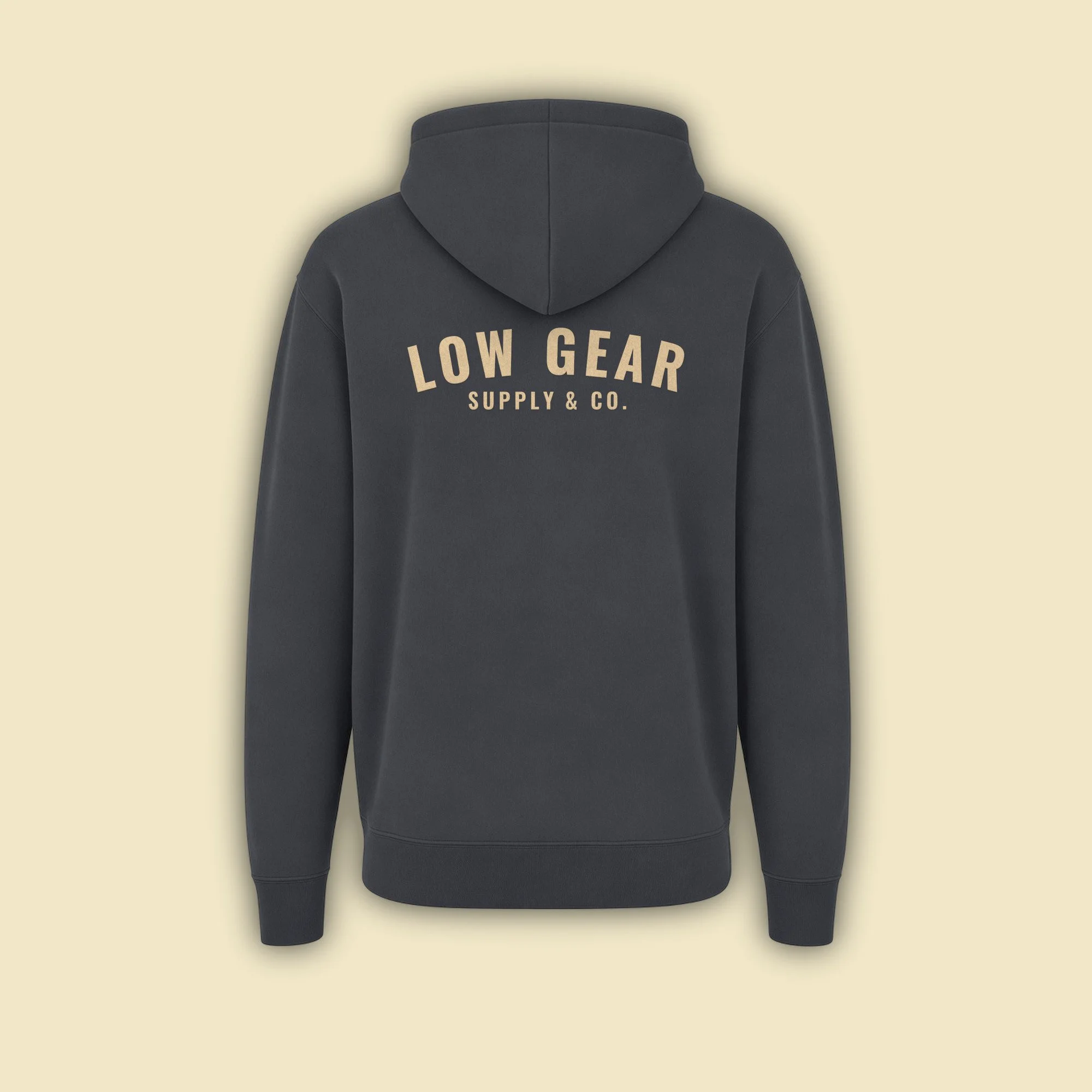 Back of the Low Gear Hoodie in Pepper, with LOW GEAR arched over SUPPLY & CO. in sand flock
