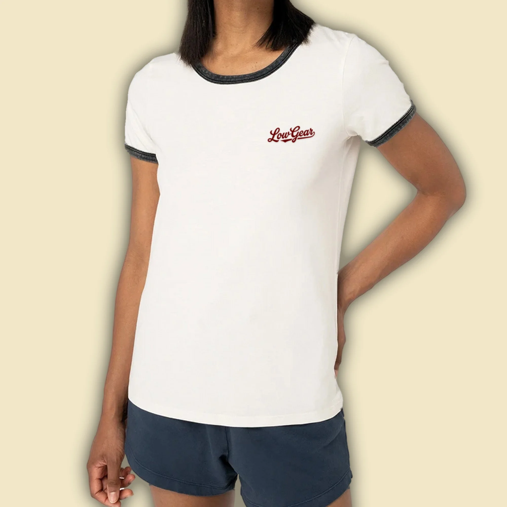 Trackside Ringer women's cut tee, ivory with washed black ringer collar and cuffs and a burgundy flock Low Gear script on the left chest