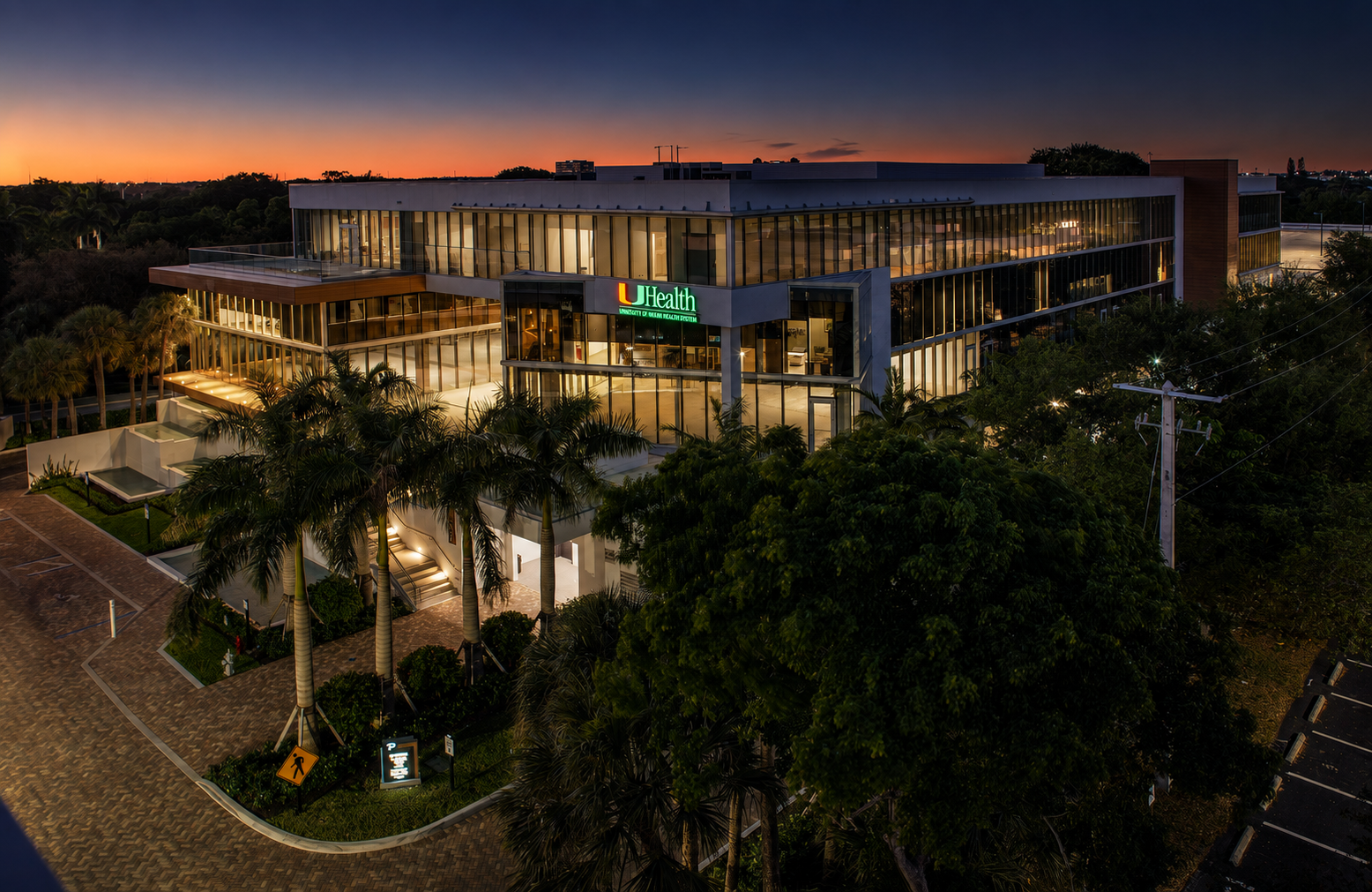 Evening exterior of Artist MD in Boca Raton at the UHealth building