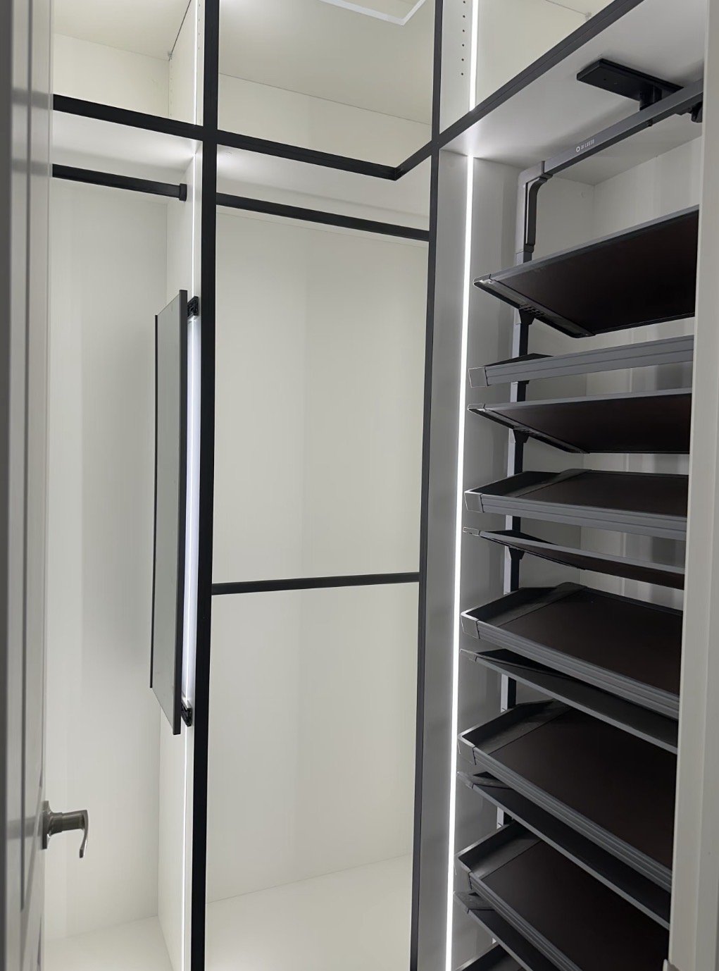 Empty retail or storage closet with shelves and compartments.