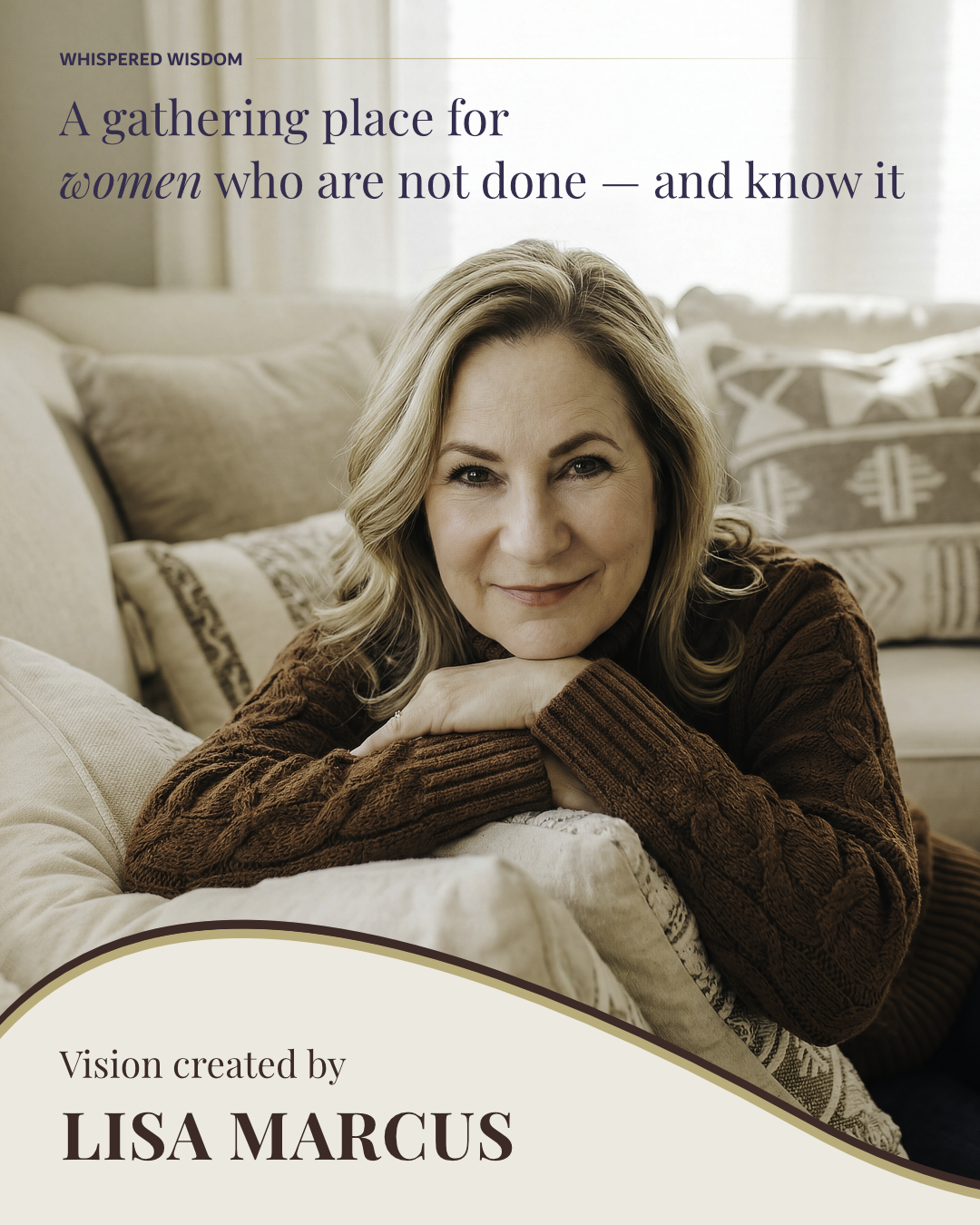 A woman with blonde hair, wearing a brown sweater, resting her head on her hand and smiling, sitting on a beige sofa in a cozy setting with pillows and curtains in the background.