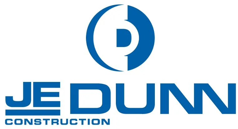 Je Dunn Construction logo with a blue circle and the letter D inside, and the company name in bold blue letters.