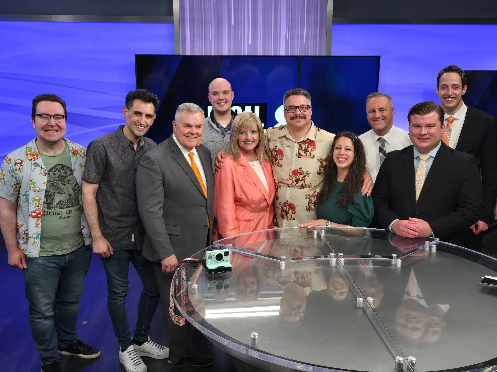 Seth Randal with a group of former TV news colleagues.
