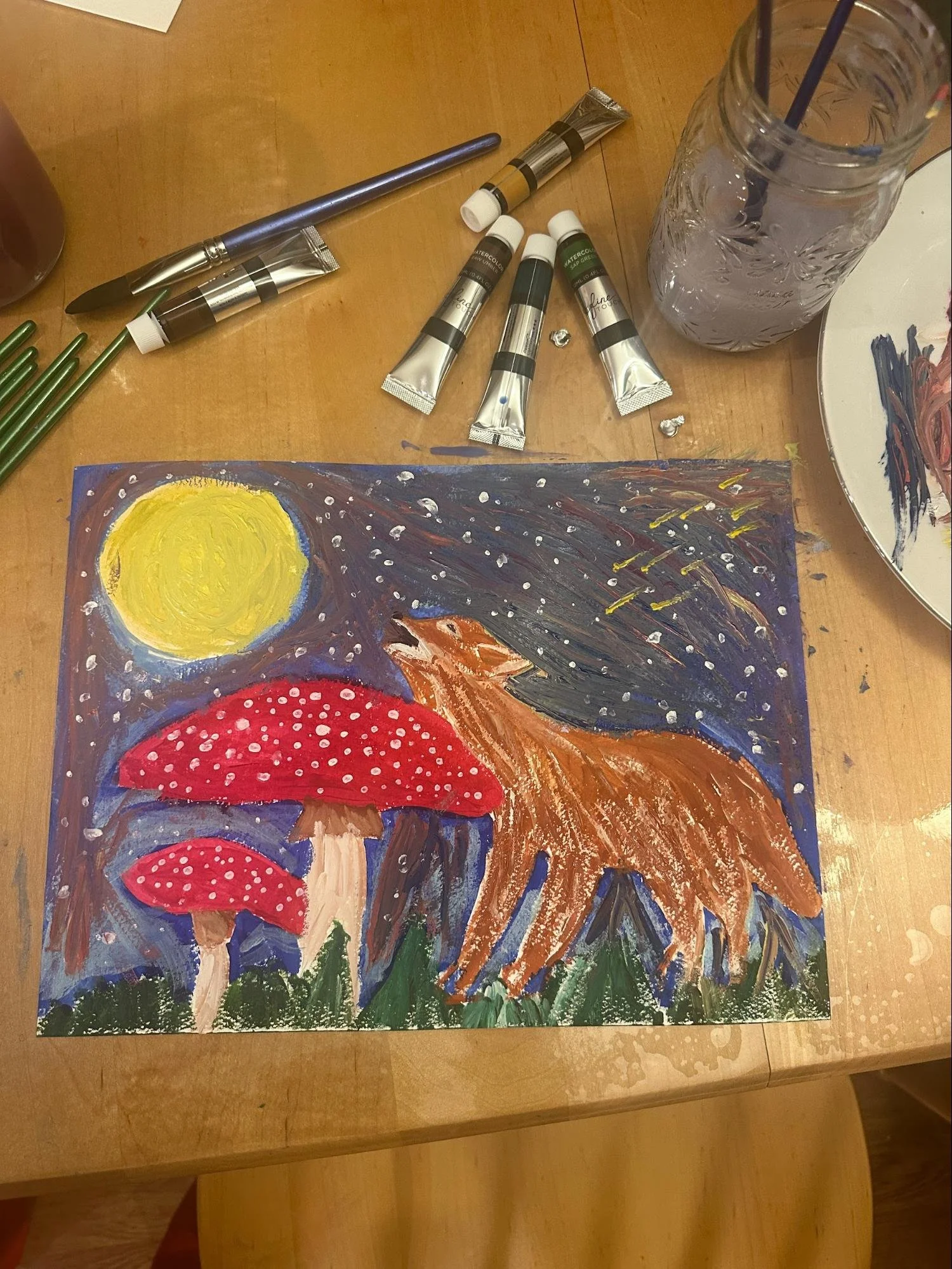 Colorful painting of a summer scene with a bright yellow sun, red mushrooms with white spots, green grass, and a blue sky.