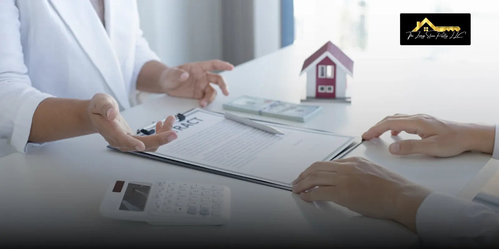 A homeowner reviewing and discussing a property contract with a buyer at a desk, with a house model and cash nearby, showing what is the fastest way to sell your house in Reno through a private, no-pressure sale process.