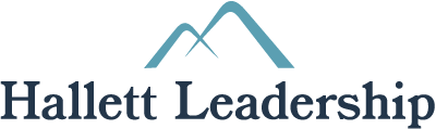 Logo of Hallett Leadership with two stylized mountains above the text